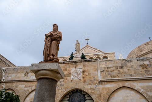 Saint Jerome (Hieronymus) sculpture on the column at St. Catherine`s Church © vadiml