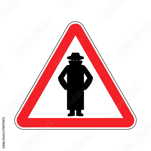 Attention spy. Caution secret agent! Triangular road sign