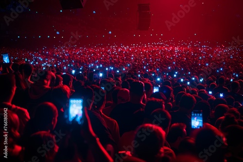 Dynamic Sea of Fans Capturing Concert Moments, Colorful Illumination