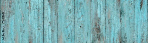 Background of vertical old vintage cracked rough blue wood planks in Provence style 