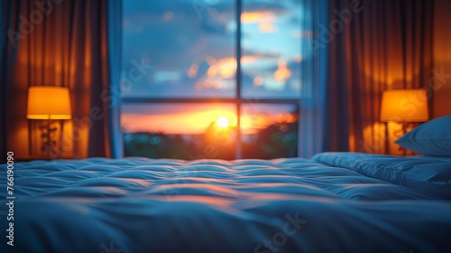  a bed sitting in a bedroom next to a window with a view of a sunset outside of a bedroom window.