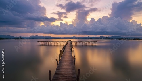 pier and river landscape view at sunset in kampot town cambodia photo