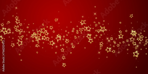 Gold sparkling star confetti.