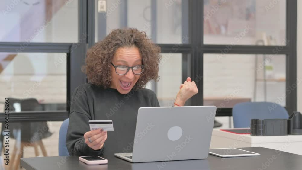 Mixed Race Woman Doing Online Payment at Work Mixed Race Woman Doing Online Payment at Work