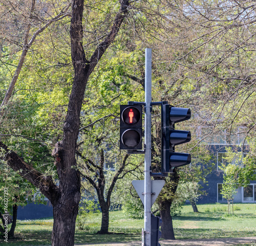 Traffic light for pedestrains on red light photo