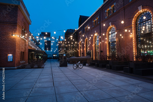An old factory renovated and transformed into shopping mall in Warsaw, Poland on a early spring evening