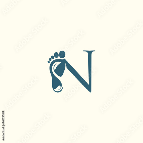 Reflexology logo design with letter and foot clinic unique concept premium vector