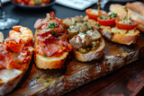 Spanish cuisine. Montaditos. Sliced bread topped with a variety of appetizers. Spanish Tapas