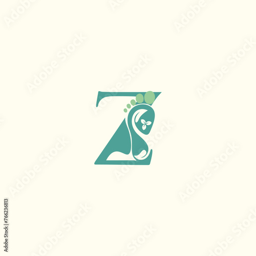 Reflexology logo design with letter and foot clinic unique concept premium vector