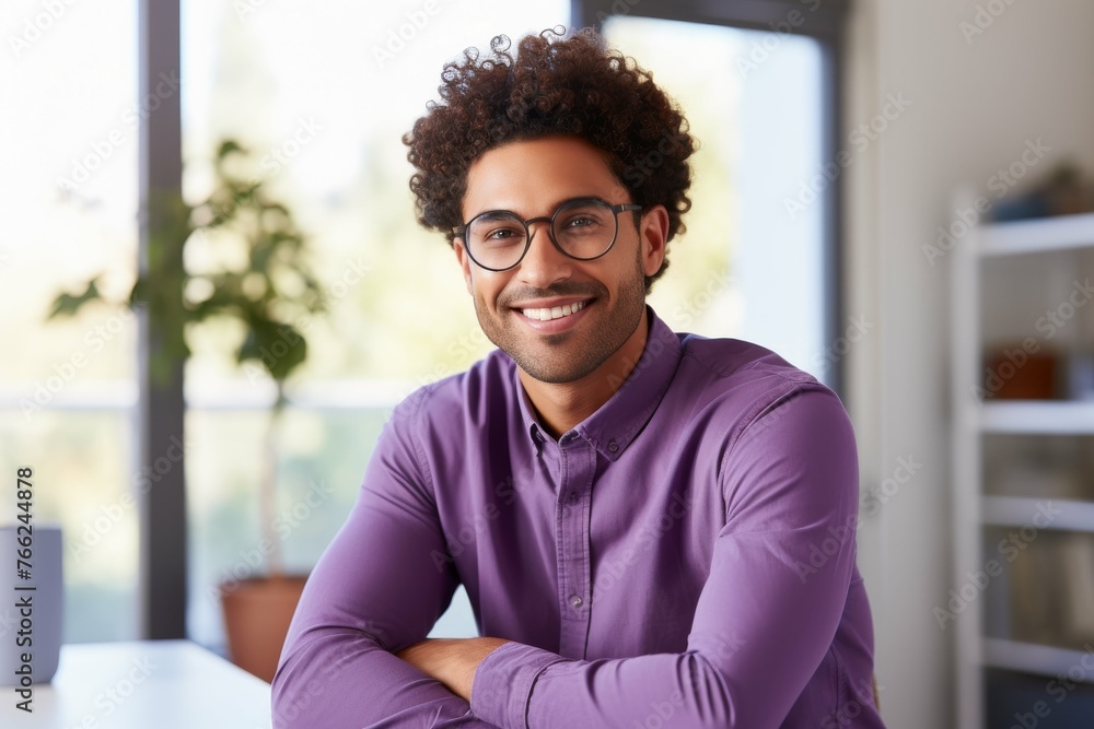 Man With Glasses Sitting at Table Man With Glasses Sitting at Table