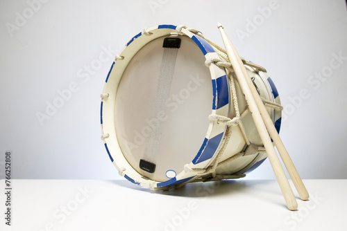 Marching Drum isolated on white background with drumsticks