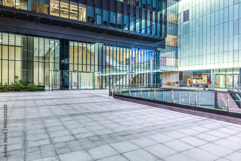 Empty square pavement and glass building background