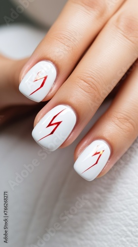 Elegant Red and White Manicure on Womans Hand