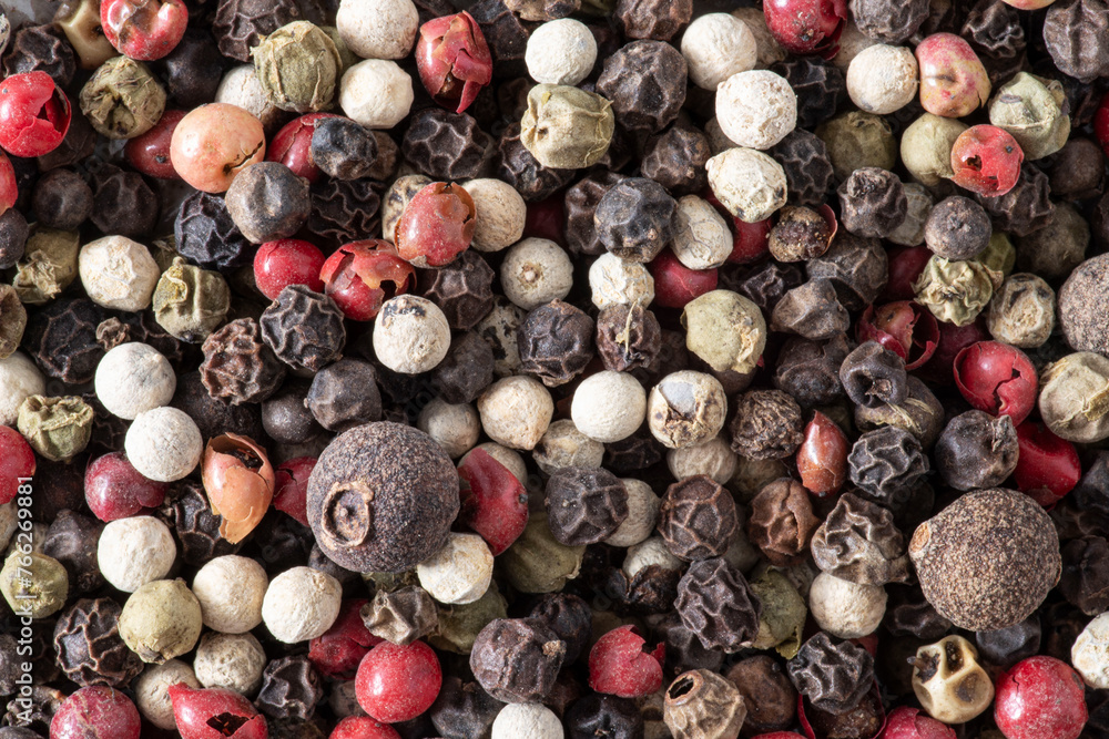 Five berry mix, a blend of different peppers on a white background Five berry mix, a blend of different peppers on a white background