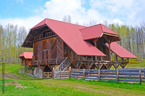 Modern wooden barn with red roof, Canada