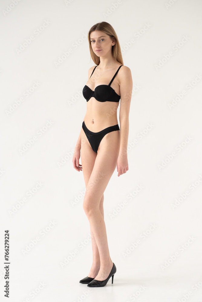 Snaps. Test Shots young model for modeling agency on a white background Snaps. Test Shots young model for modeling agency on a white background
