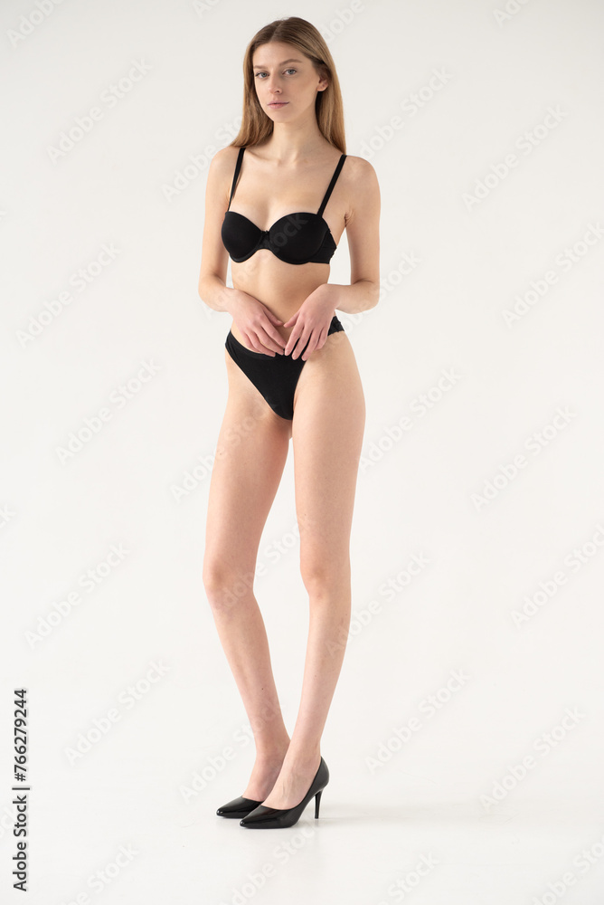 Fototapeta premium Snaps. Test Shots young model for modeling agency on a white background