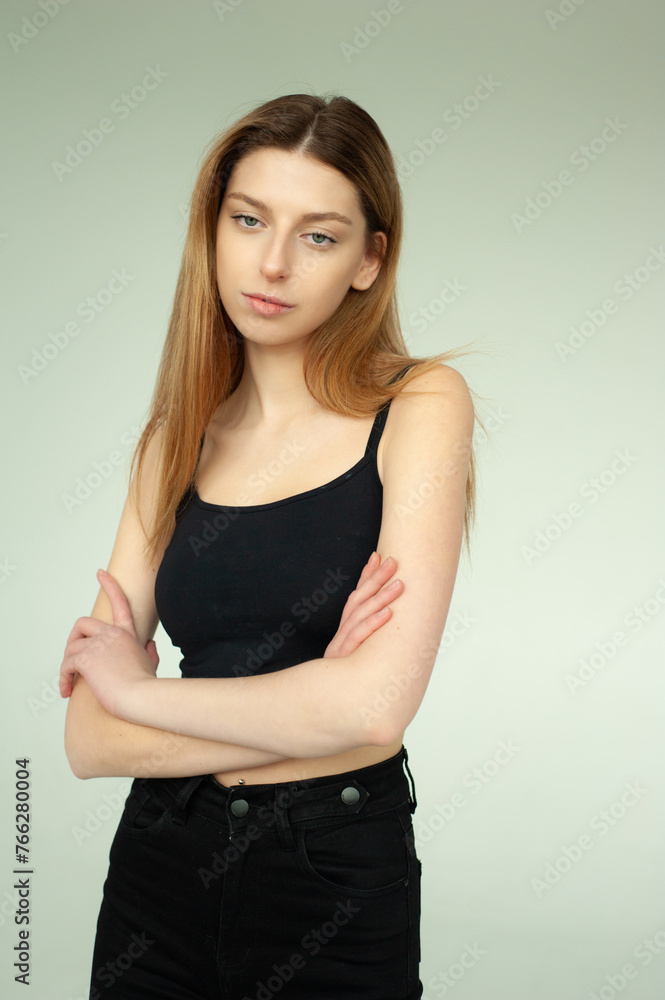 Snap Models. Full length portrait of a beautiful brunette woman in black bikini isolated on white background Snap Models. Full length portrait of a beautiful brunette woman in black bikini isolated on white background