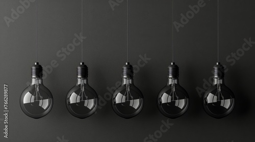 Group of Light Bulbs Hanging on Line