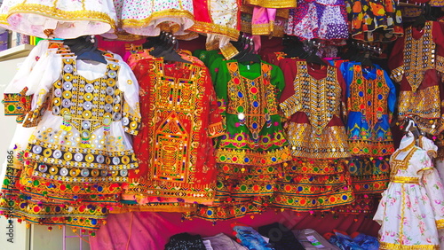 Fotografie Colorful Traditional Dresses On Display, Vibrant Cultural Clothing In Outdoor Ma