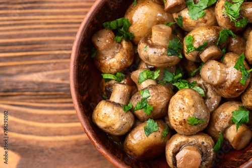 Fried mushroom champignon with onion and parsley