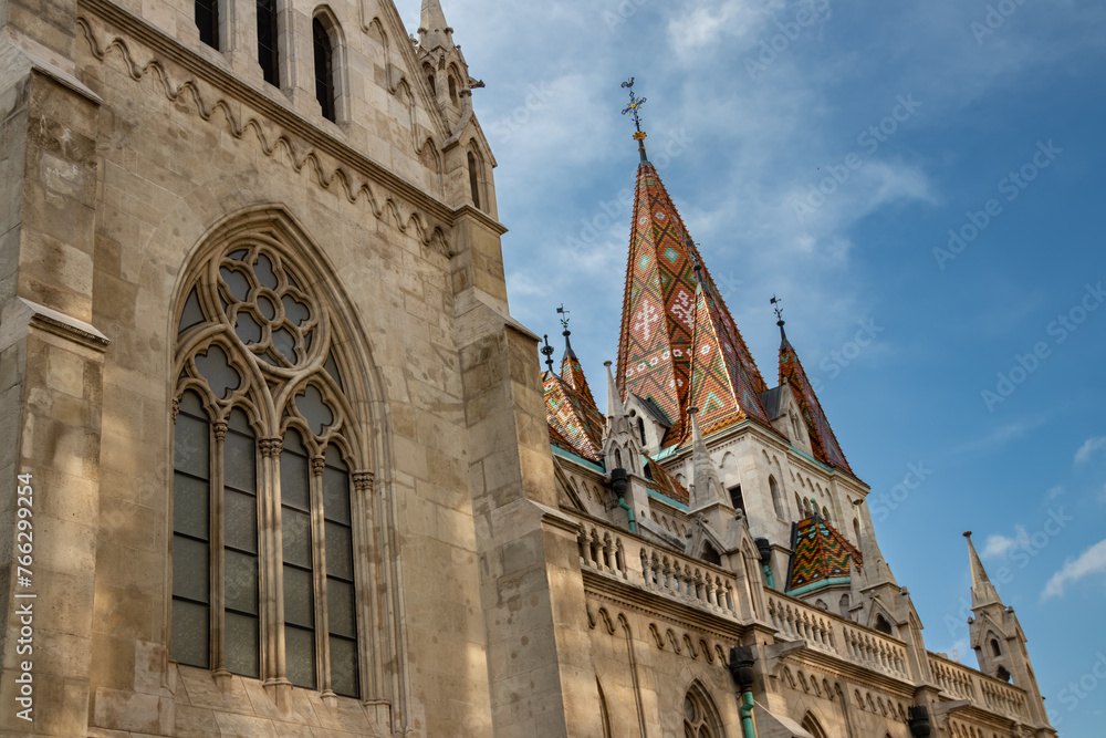 Famous historic Matthias Church in Budapest, Hungary, a must-visit landmark. Gothic architectural and decorative colorful powerful style, Catholic church with neo-Gothic style