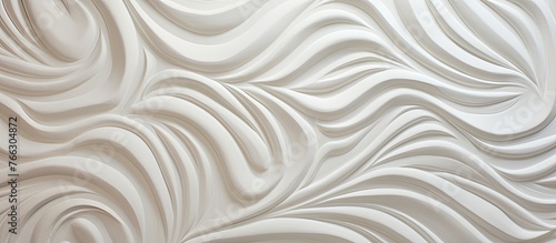 Detailed view of a wall surface showcasing intricate white design elements and patterns