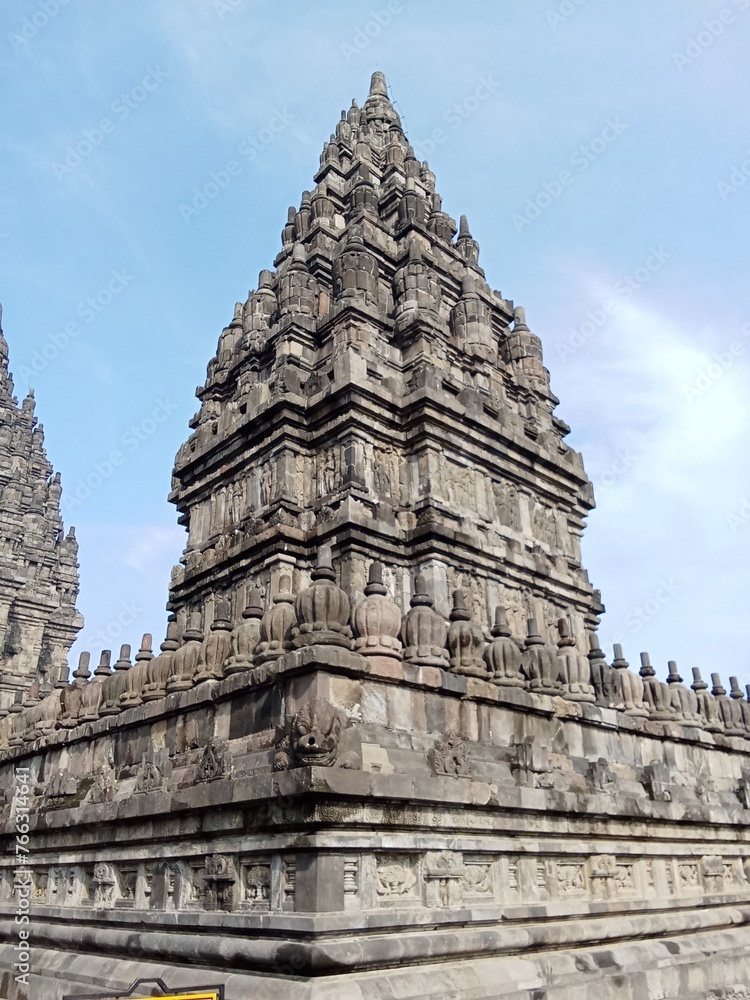Prambanan temple with bright blue clouds