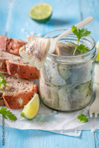 Fresh and delicious pickled fish served with coriander and bread.