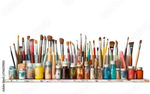 Neat Arrangement of Art Supplies with Paintbrushes and Paints Isolated on Transparent Background PNG.