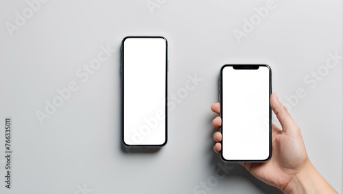 hand holding smart phone with blank screen on white background with copy space, space for text and design 