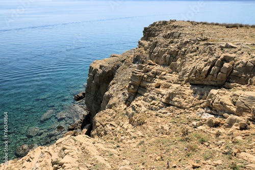 Nature of blue sea and sandstone in Lopar on the island Rab, Croatia photo