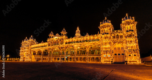 Spectacular Light illumination of Royal Mysore Palace is illuminated with 97000 electric bulbs on Sundays, national holidays & during ten days of Dasara Celebrations. Mysore, Karnataka, India.