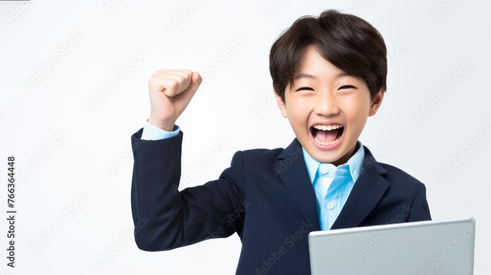 Portrait of a asian boy showing biceps, kid is smiling and holding tablet, white background. Portrait of a asian boy showing biceps, kid is smiling and holding tablet, white background.