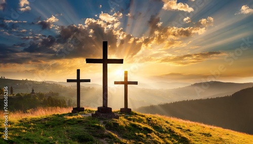 Cross in the mountains background sunset