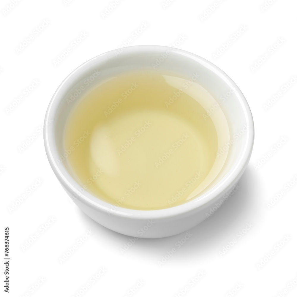 Single white bowl with natural vinegar isolated on white background close up Single white bowl with natural vinegar isolated on white background close up