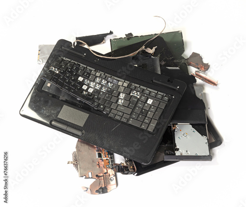 Old broken laptop isolated on white background