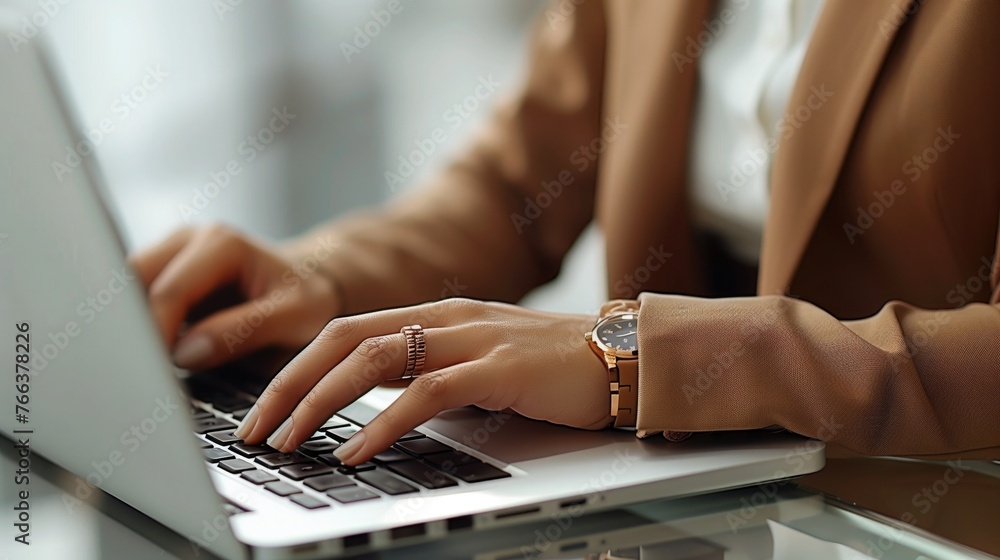 a woman in a brown suit typing on a laptop, business photo, office worker, Entrepreneur young woman