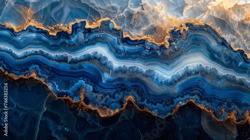 A gorgeous blue paint with gold powder drips from this abstract ocean ART piece. It incorporates the swirls and ripples of marble or the ripples of agate.