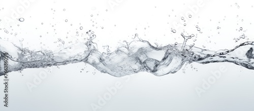 Close-up view of water splashing onto a plain white surface