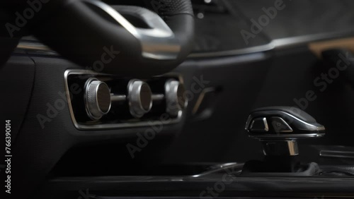 Premium car interior, controls, buttons and leather seats