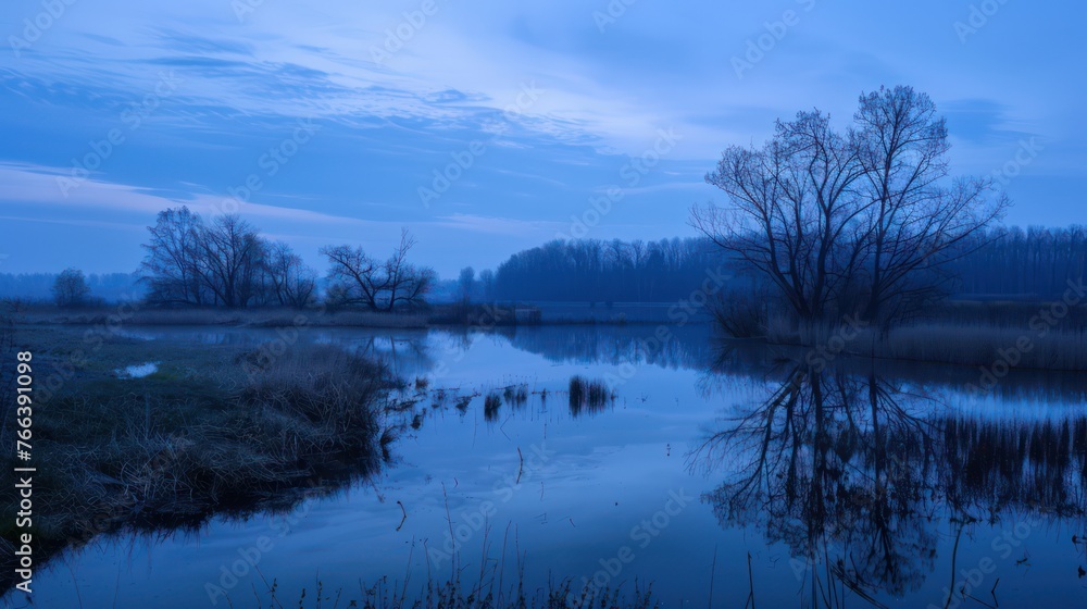 Before sunrise, the blue hour paints a beautiful spring morning scene.
