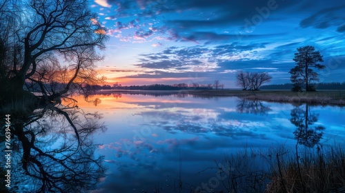 Serene blue hour landscape photography captured during the tranquil morning of a spring day © Matthew