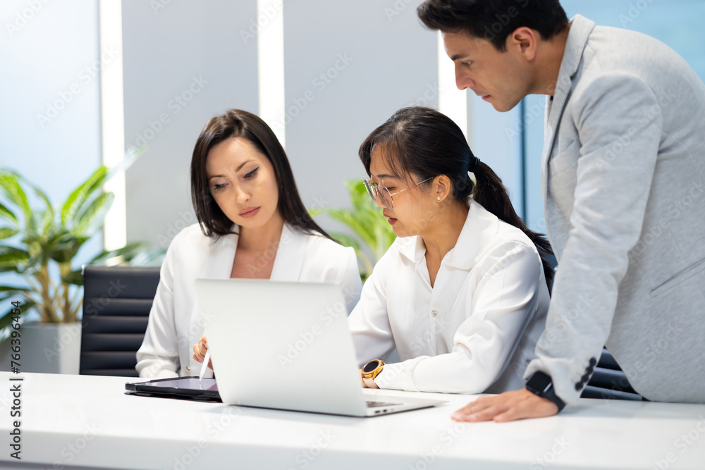 Business meeting - Group of friends meeting at home. Diverse business people asian woman and caucasian man discussion in corporate meeting at conference room Business meeting - Group of friends meeting at home. Diverse business people asian woman and caucasian man discussion in corporate meeting at conference room