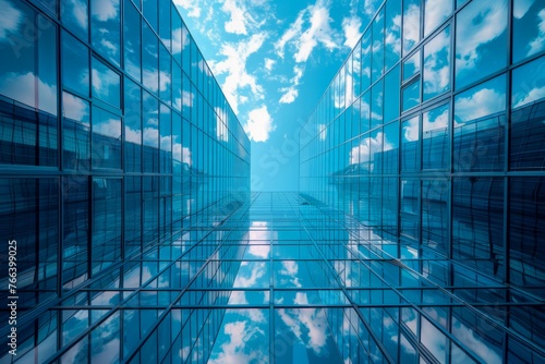 Modern Corporate Office Building Facade Reflecting Blue Sky with Clouds Glass Skyscraper Architecture
