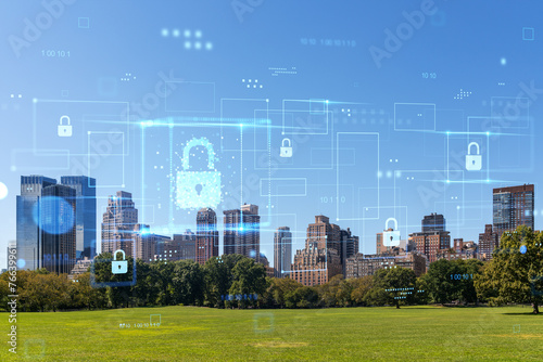 Cyber security concept over a New York City skyline with visible digital holograms of padlocks  on a clear day with blue sky. Double exposure