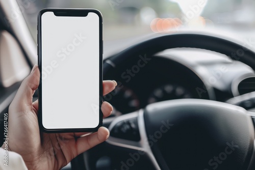 person Driver holding phone white screen on steering wheel background