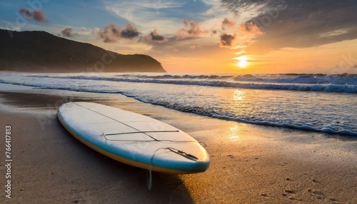 Surfboard on the beach sunset