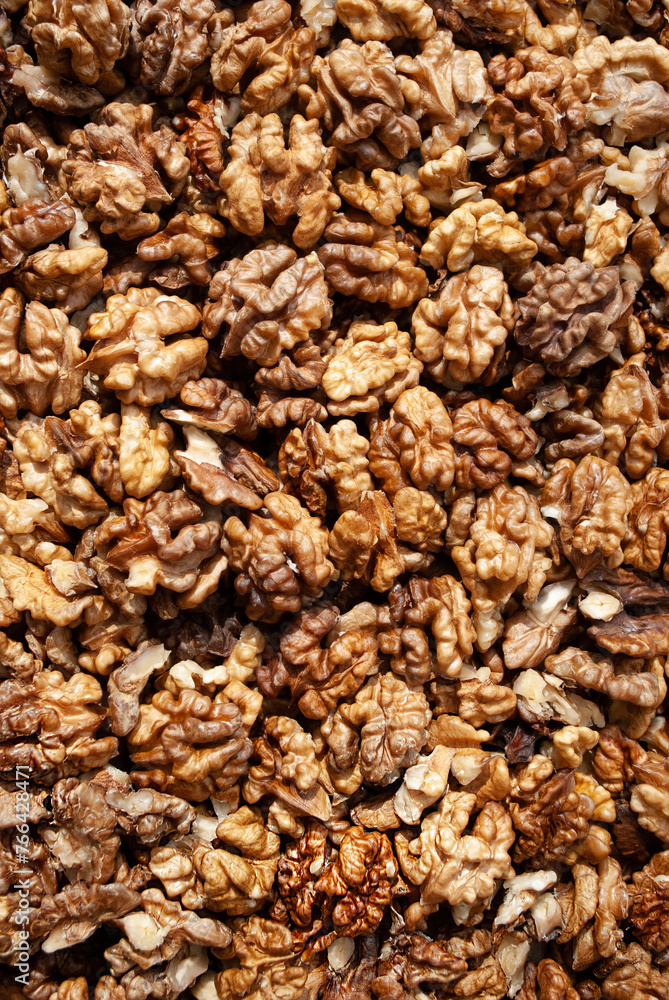 Lots of shelled walnuts. The concept of healthy eating and organic food. Vitamin food. Top view Lots of shelled walnuts. The concept of healthy eating and organic food. Vitamin food. Top view