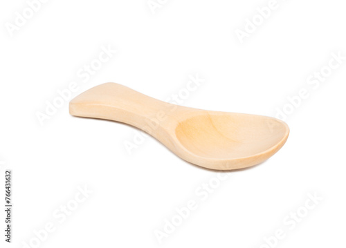 Small wooden spoon for spice isolated on white background